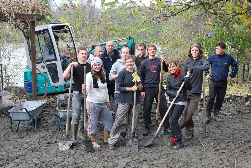 People holding shovels